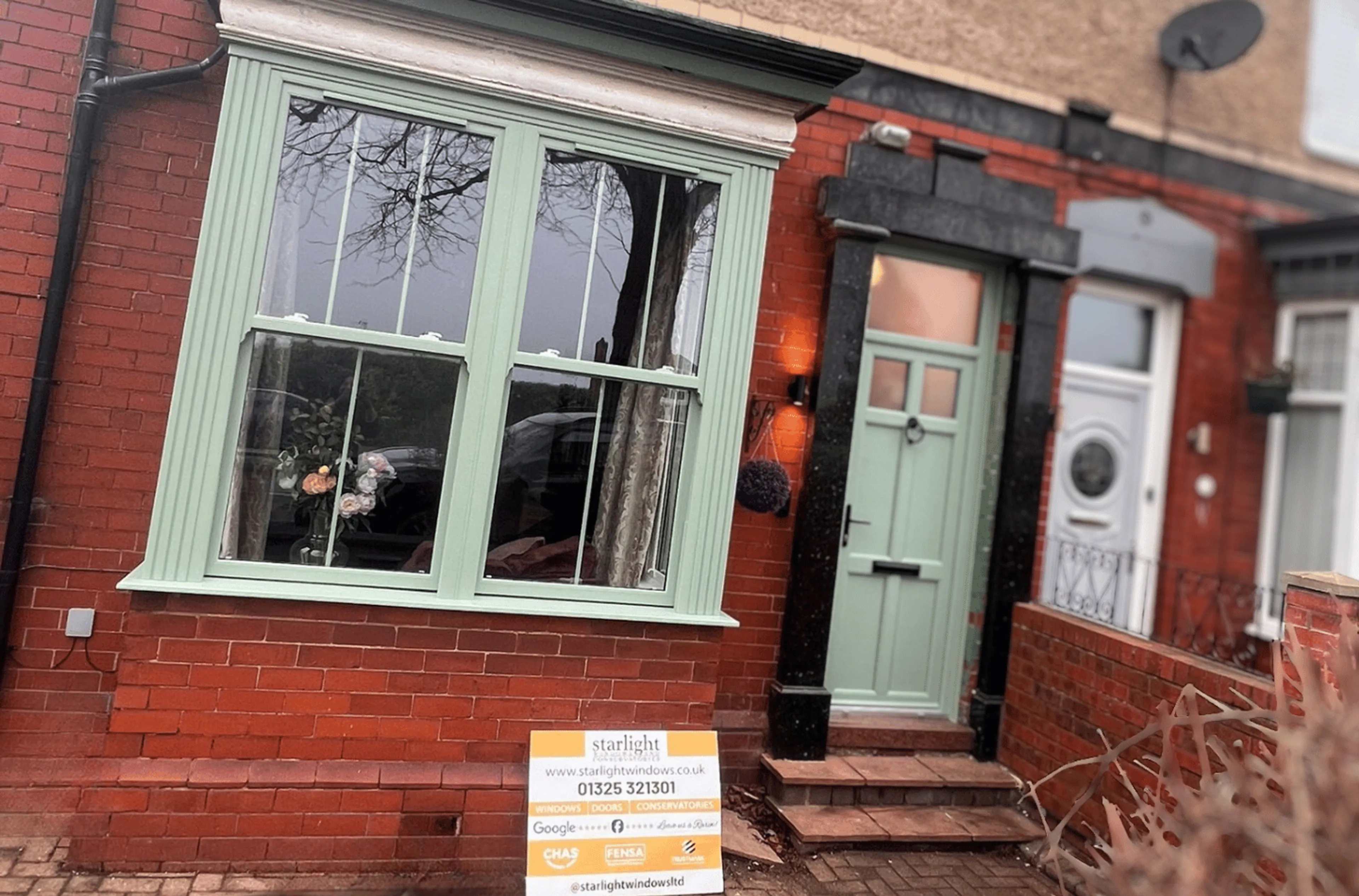 Chartwell Green Sliding Windows