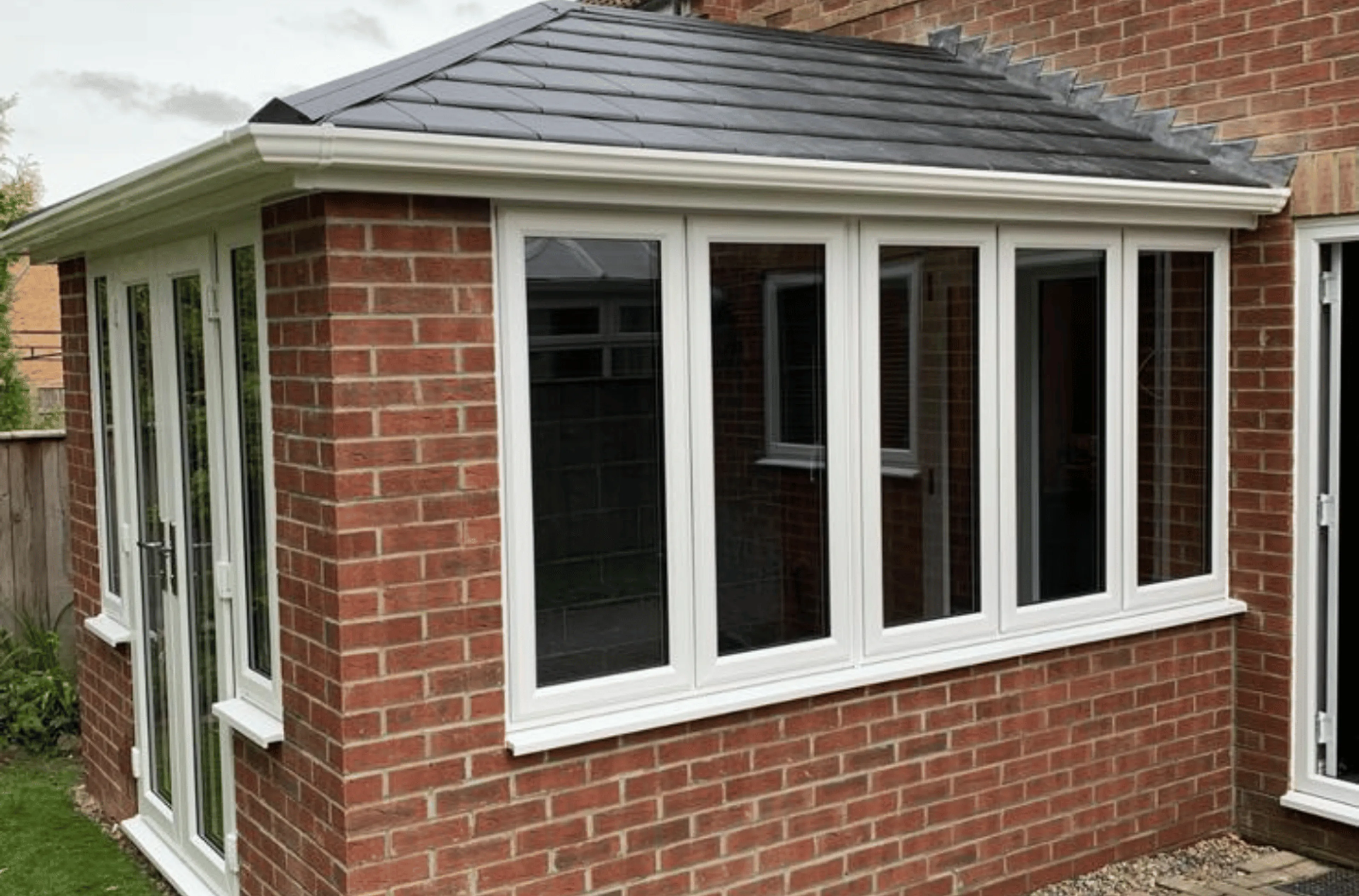Tiled warm roof conservatory with french doors