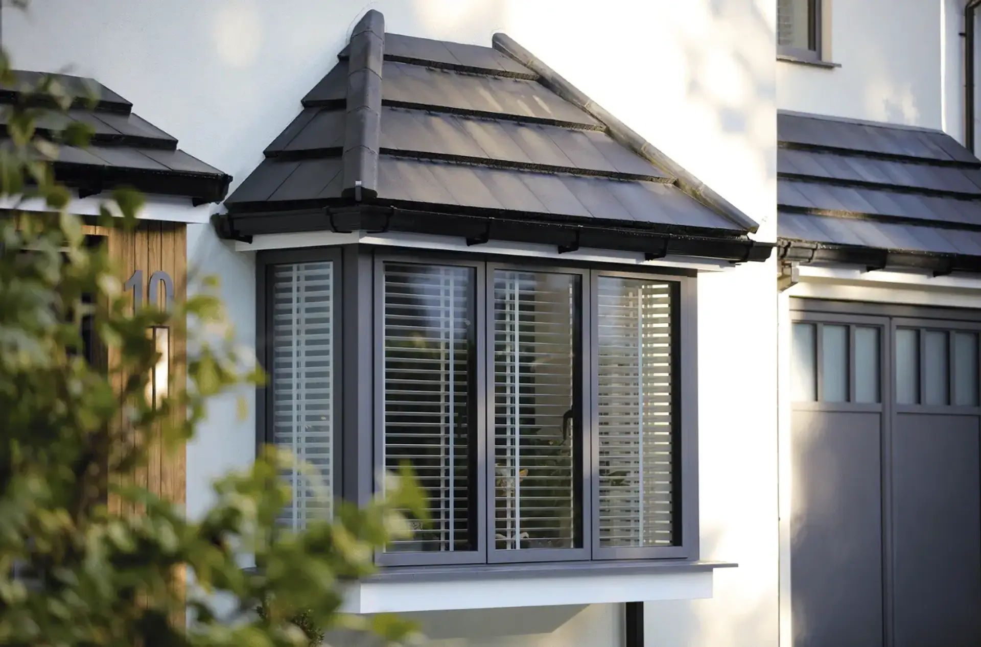 Quality Aluminium Bow Window with tiled roof