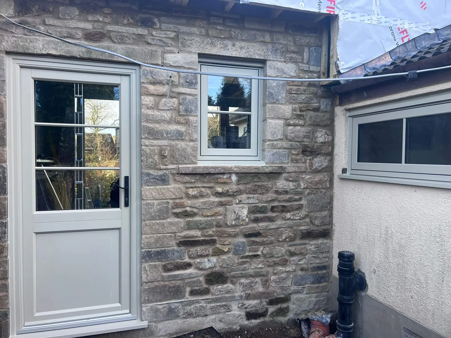 Half and half glazed uPVC panel door with decorative glass and decoration bars
