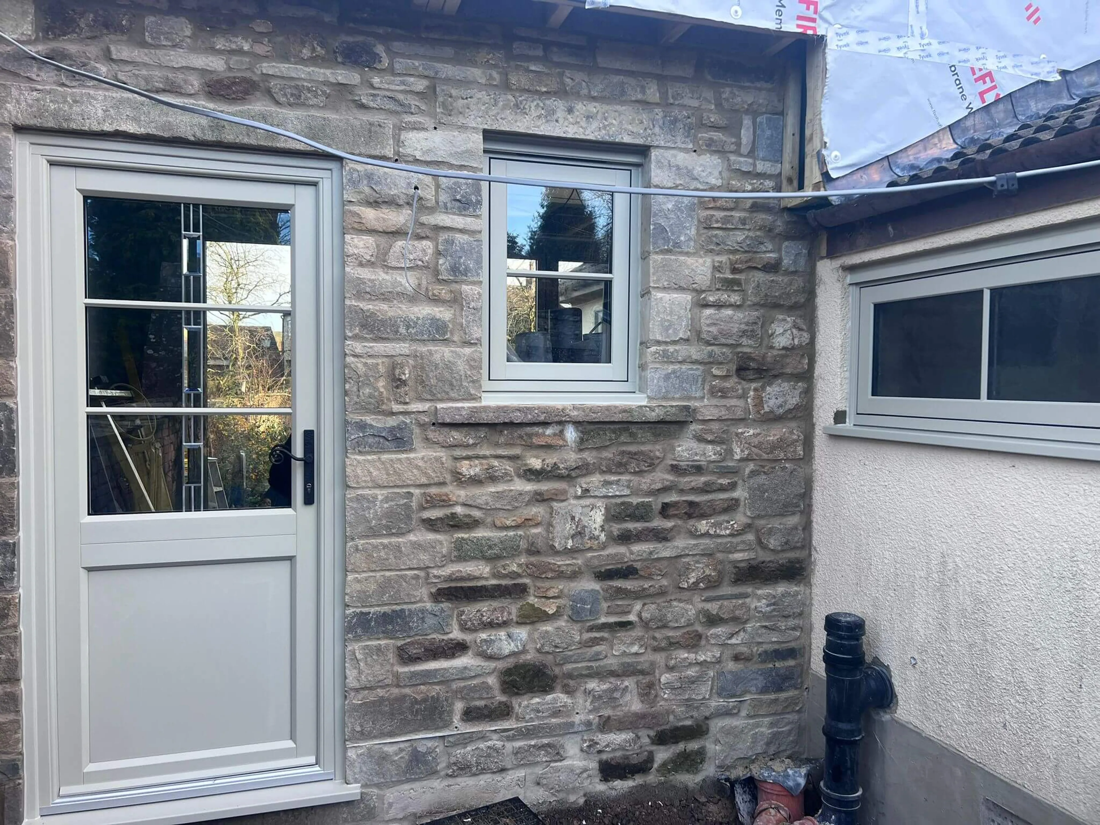 Half and half glazed uPVC panel door with decorative glass and decoration bars