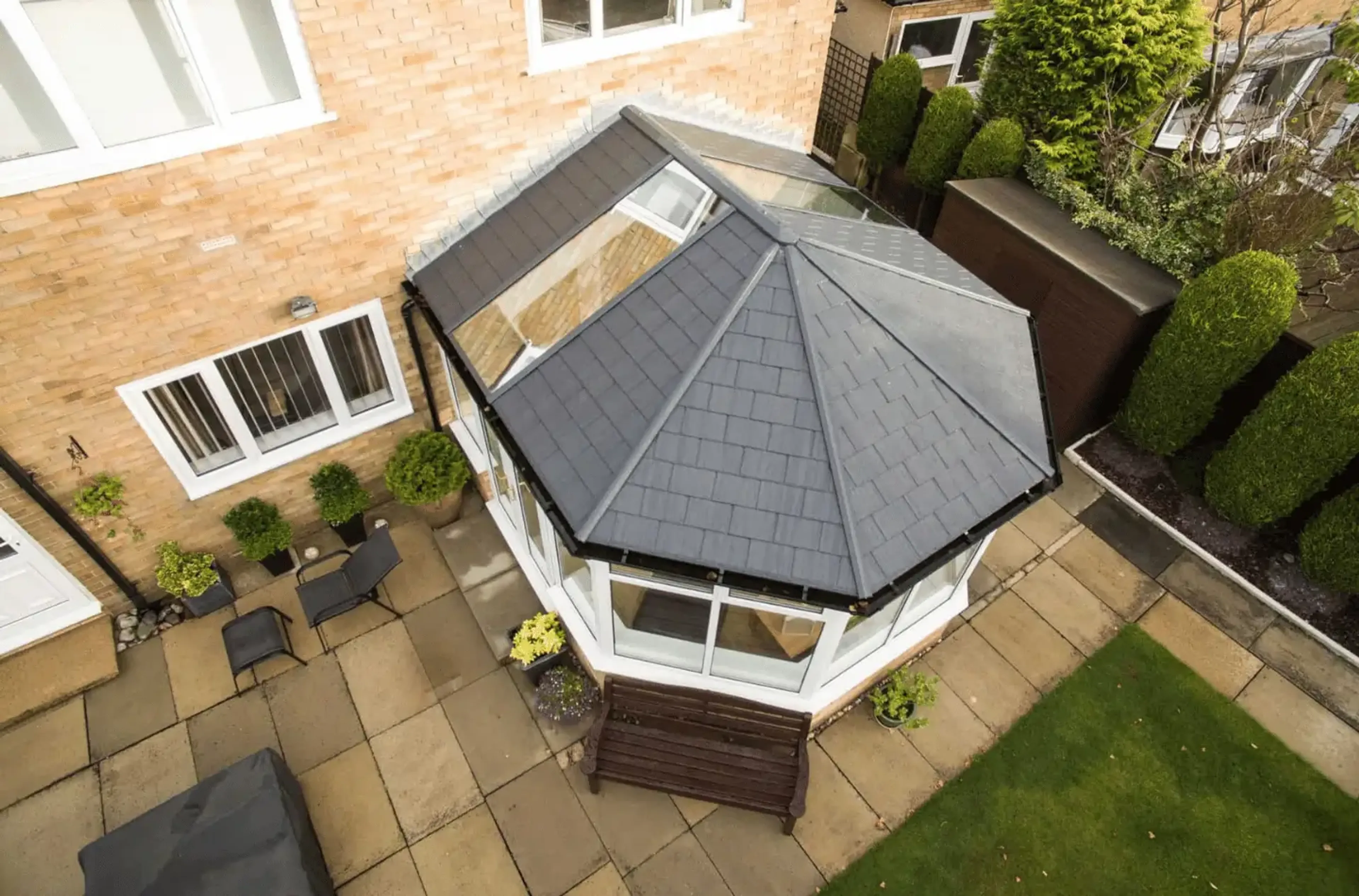 Tiled warm roof with a glass panel skylight 